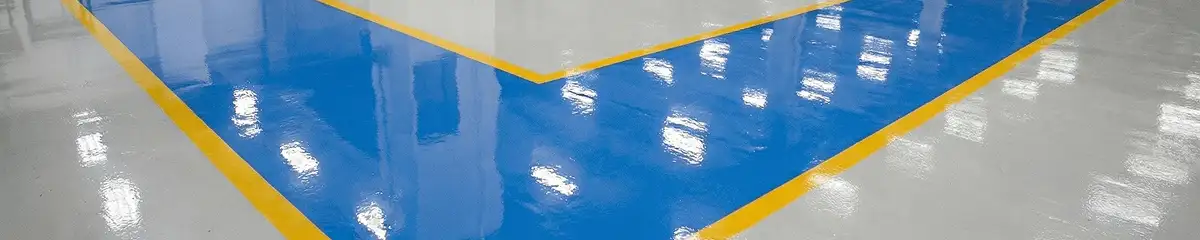 A factory floor professionally covered and marked with epoxy flooring in Columbia, MO