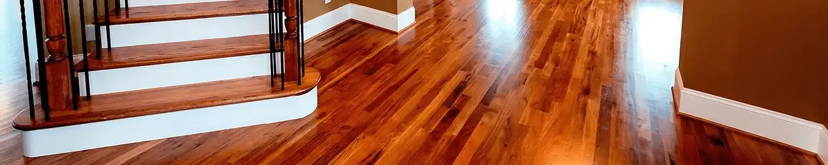 Base floor of a staircase with professionally restored wood flooring in Columbia MO