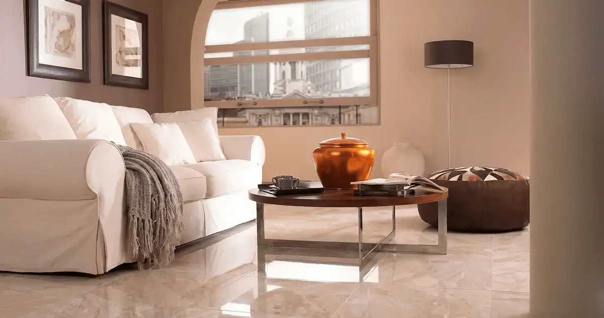 Modern living room with professionally installed marble flooring, a beige sofa, coffee table in Columbia, MO