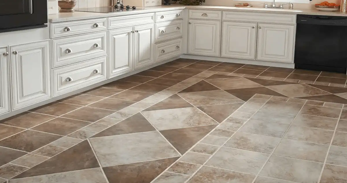 Kitchen with white cabinets and a professionally installed tile floor in Columbia, MO