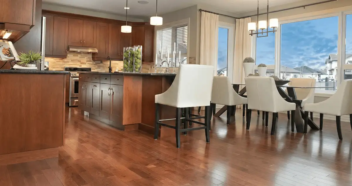 A modern kitchen with professionally installed wood flooring in Columbia, MO